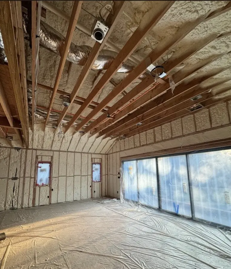 Interior walls and ceiling insulated with spray foam during new construction in Tallmadge